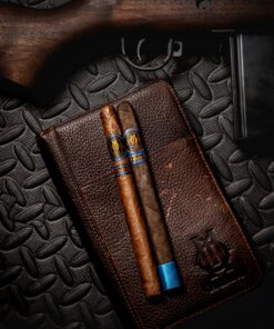 O.M Cigar Leather Cigar Case shown in an O.M. accessory display