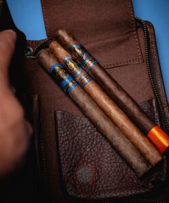 O.M Cigar Leather Cigar Case detail image connected to cigar preparation