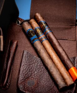 O.M Cigar Leather Cigar Case detail image connected to cigar preparation