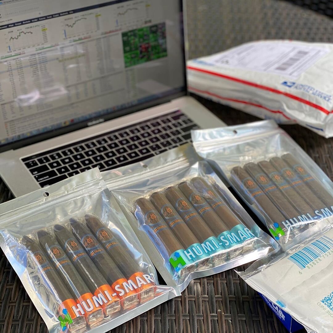 51 OM+CIGARS+ESSENTIAL+BLEND+ shown in an O.M. Cigars image