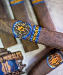 Essential Blend No. 4 box-pressed cigar laid out for cigar comparison at O.M. Cigars