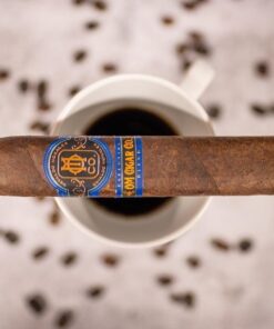 Essential Blend No. 4 box-pressed cigar laid out for cigar comparison at O.M. Cigars