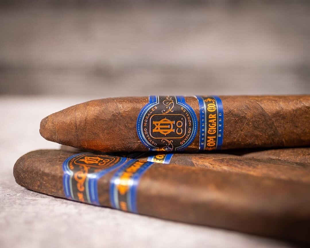 Essential Blend No. 4 box-pressed cigar | O.M. Cigars sampler Essential Blend No. 4 box-pressed cigar laid out for cigar comparison at O.M. Cigars
