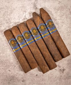 Essential Blend No. 4 box-pressed cigar shown as a sampler-led starting point from O.M. Cigars