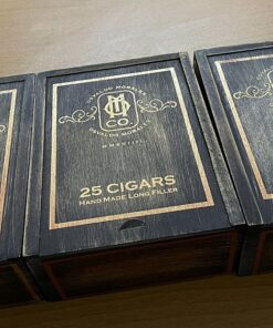 Essential Blend No. 4 box-pressed cigar laid out for cigar comparison at O.M. Cigars
