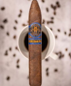 Essential Blend No. 4 box-pressed cigar laid out for cigar comparison at O.M. Cigars