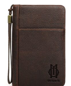 O.M Cigar Leather Cigar Case shown in an O.M. accessory display